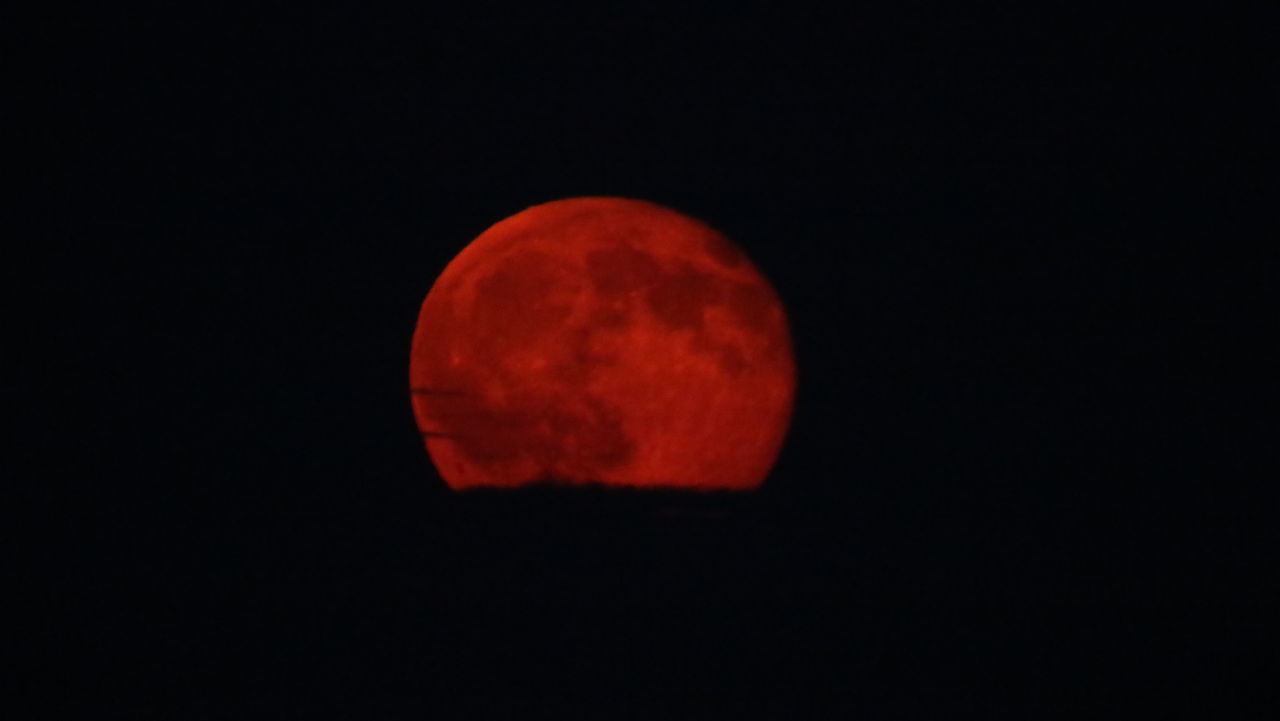 CLOSE-UP OF MOON AGAINST CLEAR SKY