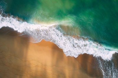 Sea waves splashing on shore