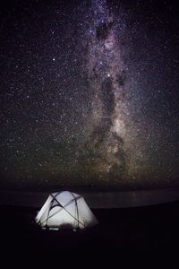 Scenic view of sea against sky at night