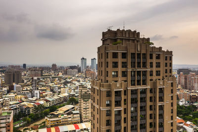 High angle view of buildings against sky