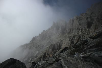 Low angle view of mountains against sky