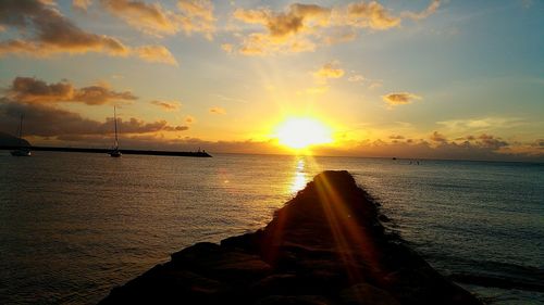 Scenic view of sunset over sea