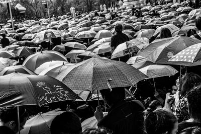 People holding umbrella outdoors