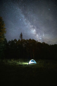 Low angle view of mountain against sky at night