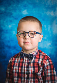 Portrait of boy wearing eyeglasses