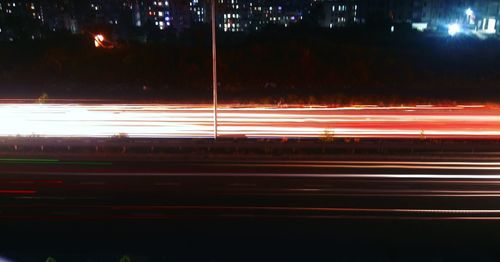 Light trails on road at night