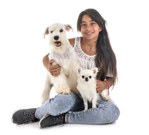 Portrait of a dog against white background