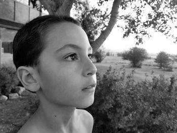 Close-up of boy looking away