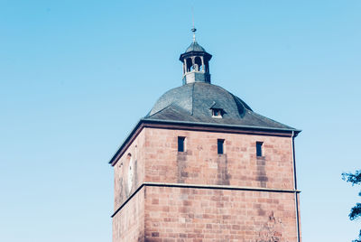 Low angle view of building against blue sky