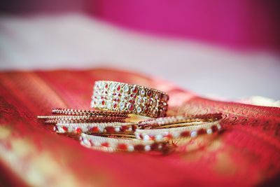 Close-up of bangles on sari