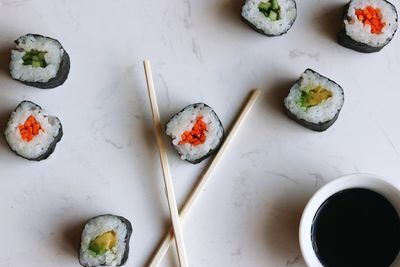 Directly above shot of sushi served on table