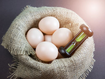 High angle view of eggs in container on table