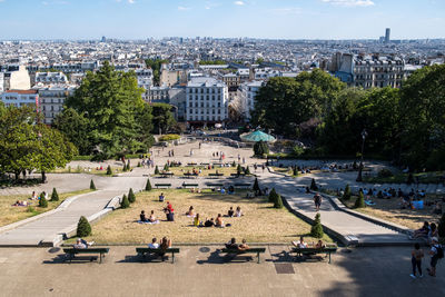 High angle view of people and buildings in city