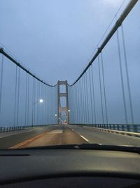 Suspension bridge against clear sky