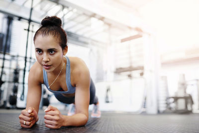 Woman exercising at gym