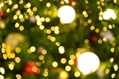 Defocused image of illuminated lights at night