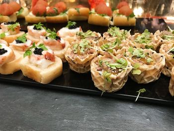 Close-up of served food on table