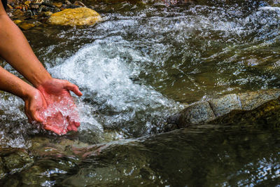 Man surfing in water