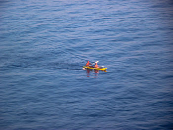 High angle view of people in sea