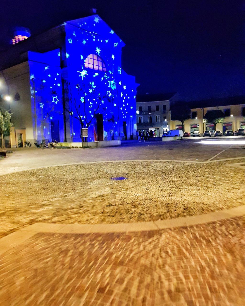 ILLUMINATED BUILDING AT NIGHT