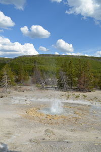 Scenic view of land against sky