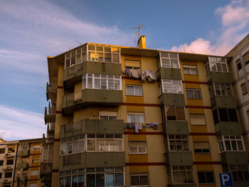 Low angle view of residential building against sky