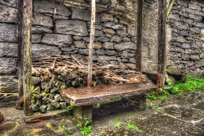 View of old stone wall in forest