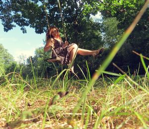 Woman sitting on grass