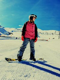 Full length of man on snowy mountain against sky