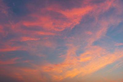 Low angle view of dramatic sky during sunset