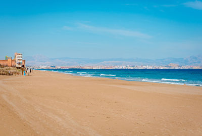 View of beach against blue sky