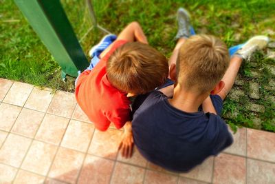 High angle view of boys on porch