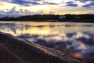 Scenic view of sunset over lake