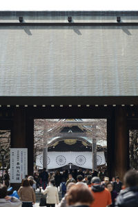 Group of people in front of building