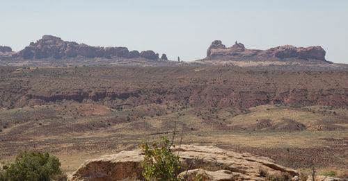 Scenic view of rocky mountains against clear sky