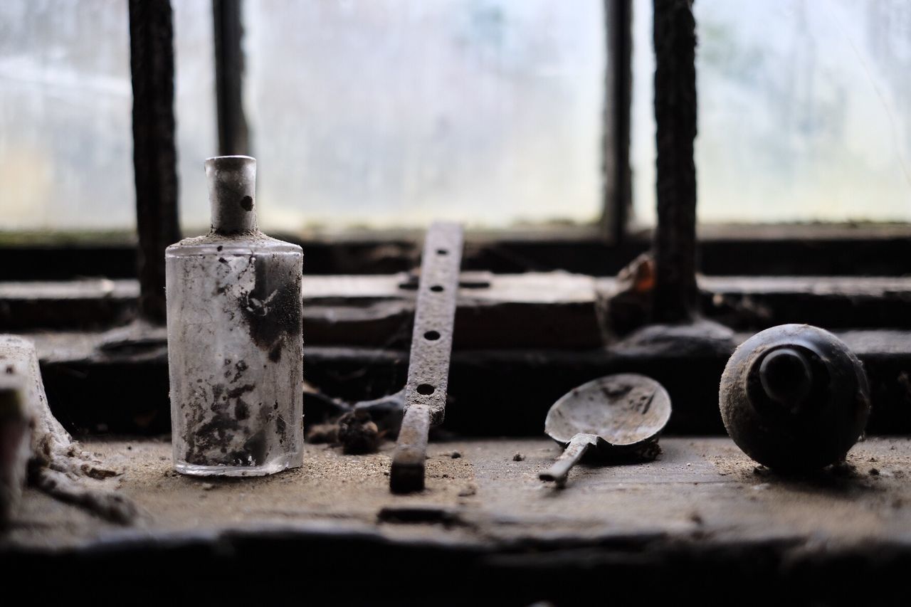 no people, focus on foreground, metal, close-up, tree, weathered, day, outdoors