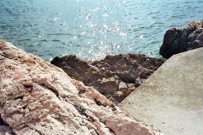 High angle view of rocks on beach