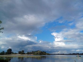 Scenic view of sea against cloudy sky