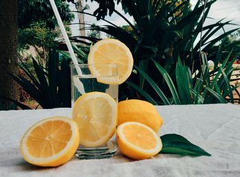 Close-up of orange juice on table