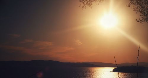 Scenic view of silhouette mountains against sky during sunset