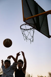 Street basketball players jumping