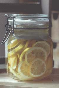 Close-up of glass jar on table