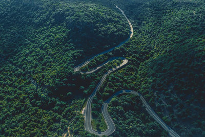 High angle view of winding road on landscape