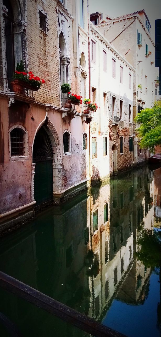 REFLECTION OF BUILDINGS ON CANAL