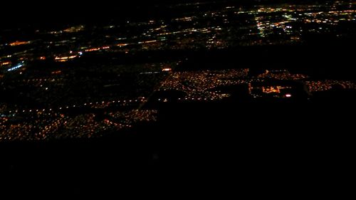 Illuminated cityscape at night