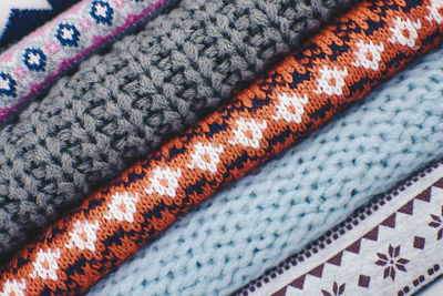 Full frame shot of stacked sweaters