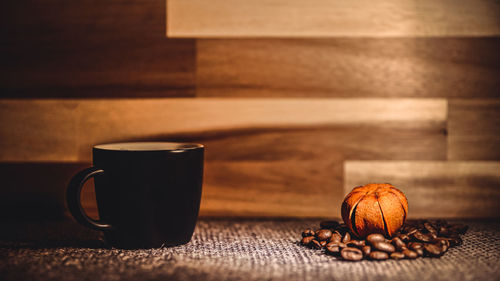 Close-up of coffee cup on table