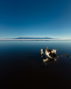 View of sea against blue sky