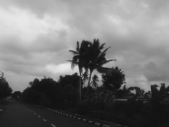 Road against cloudy sky