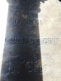 Close-up of text on metal